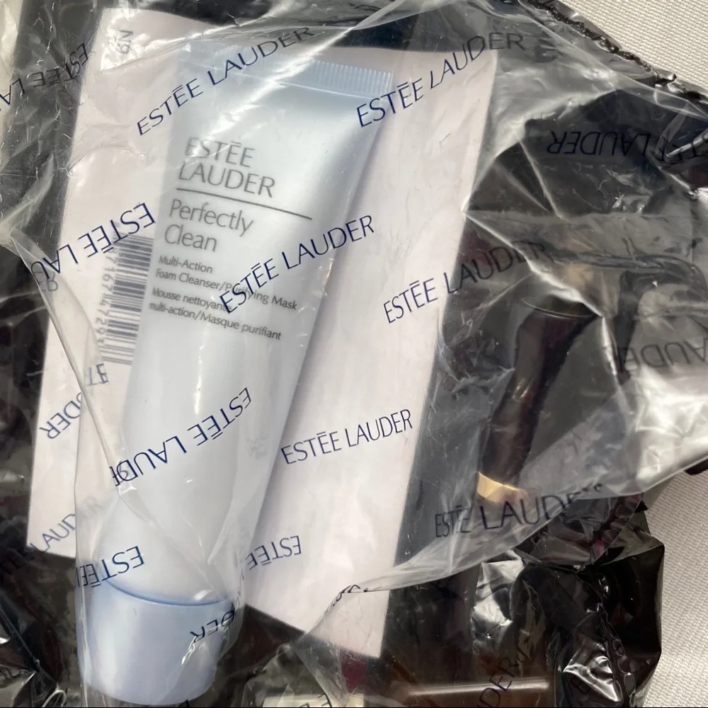 Estée Lauder bag, lipstick, night repair, cleanser